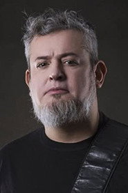 Photo of Paulo Jr. as Bass