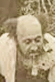 Photo of David Camargo as Professor