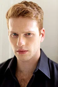Photo of Grant MacDermott as Tom
