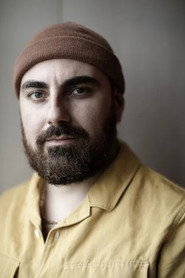 Photo of Sargun Oshana as Mehmet