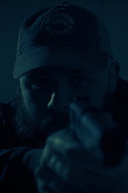 Photo of Craig Walton as CIA Agent 2