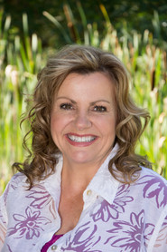 Photo of Maureen Andronis as May