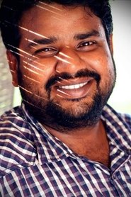 Photo of Nalan Kumarasamy as Doctor Rakesh