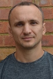 Photo of Andrius Davidenas as Masked Mob Member