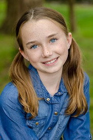 Photo of Olivia McMahon as Katie Peck