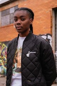 Photo of Beatrice Domond as Father Skateboarder