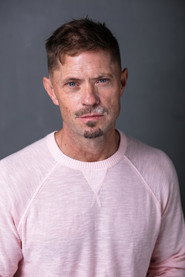 Photo of Reginald Ammons as Earl Cooper