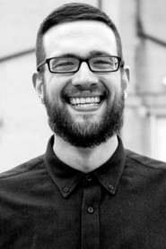 Photo of Jay Drakulic as Host of Unresolved Mysteries