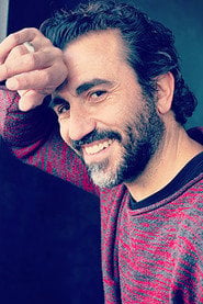 Photo of Paolo Elmo as Carlos