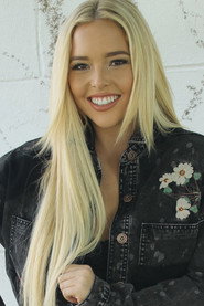 Photo of Lexi Collins as Katie  O'Brien