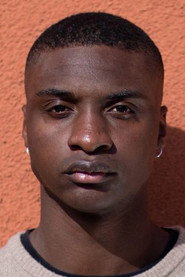 Photo of Maada Mambu Kaikai as Theo