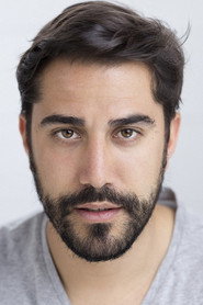 Photo of Agustín Mateo as Agent Palmer Eldritch / Batfro