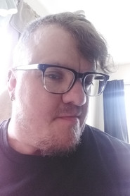 Photo of Ben Harris as Voice of Figure