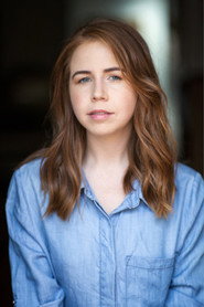 Photo of Nicole Tudor as Mia