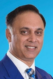 Photo of Koobeshan Naidoo as Elvis Kandasamy