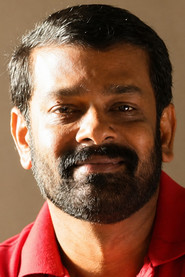 Photo of Vasanth as Karthik's father