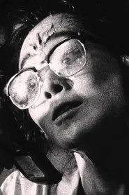 Photo of Nobu Kanaoka as Woman in Glasses