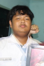 Photo of Ahmad Bustomi as Tomi