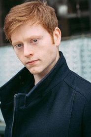 Photo of Alexander Lowe as August