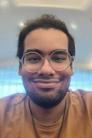 Photo of Arthemis Farias as Human in the couch