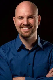 Photo of Mark Edward Lewis as Red / Rev. Dr. Michael Bertrand / Dagger (voice)