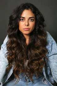 Photo of Juliana Almeida as Chefe da Rayra