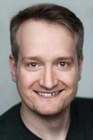 Photo of Christopher Laishley as Newscaster