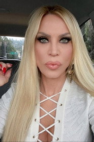 Photo of Amber Lynn as (archive footage)