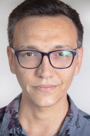 Photo of Jorge Torres as Cafe Waiter
