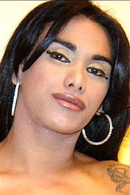 Photo of Claudia Lins as (archive footage)