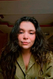 Photo of Evs Cris as Sara