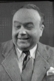 Photo of Noël Darzal as Ernest, bartender
