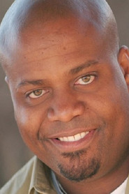 Photo of Chris Grundy as Officer Evans