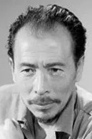 Photo of Xingjia Qi as Chief Zhang