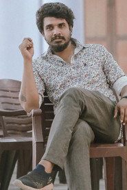 Photo of Amal Oscar as Alex