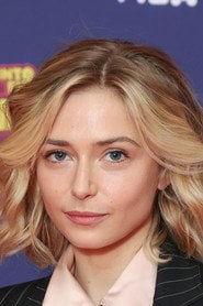 Photo of Sophie Simnett as Ella