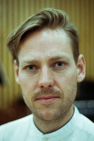 Photo of Robert Ames as Self - Conductor