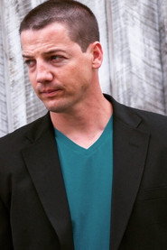 Photo of Scott Thomas as Cal Rowan