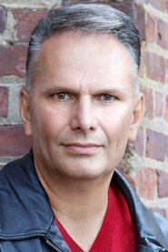 Photo of Tommy Bayiokos as Police Lineup Mob Boss