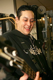 Photo of Paul Gray as Bass/Backing Vocals