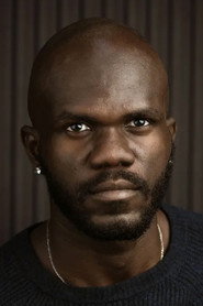 Photo of Tobi Marho as Colonel Basiru's ADC