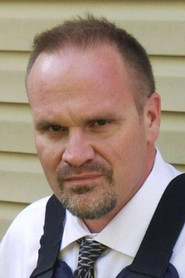 Photo of Tom Scorzone as Detective