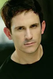 Photo of Brandon Carroll as Devin