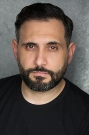Photo of Yassine Mkhichen as Specialist Firearm Officer Adnan