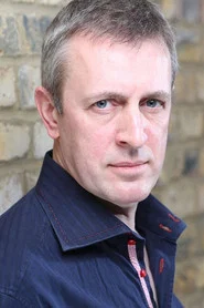 Photo of Adam Templar as Captain Paul