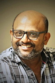 Photo of Jibu Jacob as Commissioner