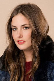 Photo of Elyssa Erhardt as American foreign ambassador