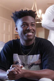 Photo of Kamron Henry as Eli Williams