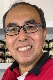 Photo of Manan Sulaiman as Syed Mustaffa