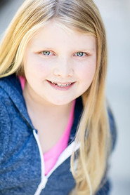 Photo of Adora Soleil Bricher as Alice
